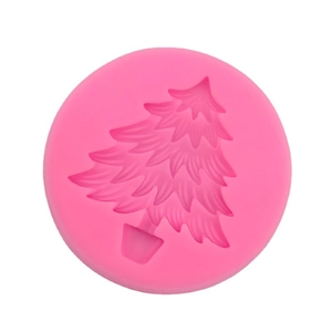 Pink silicone mold featuring a detailed Christmas tree design for baking and DIY crafts