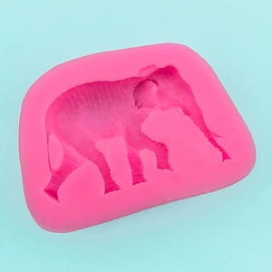 Detailed macro view of a pink elephant-shaped silicone mold with realistic animal skin texture
