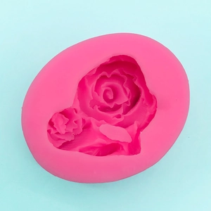 Detail view of pink silicone rose mold for chocolate and handmade soap making