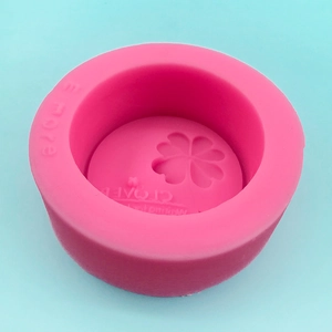 Pink silicone four-leaf clover mold for handmade soap and candle DIY projects