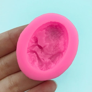 Pink silicone mold with European vintage figure relief for chocolate and fondant cake