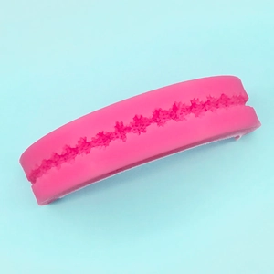 Pink silicone fondant mold with star pattern for DIY cake border and baking decoration