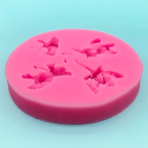 Pink silicone mold featuring four fairy angel wings for fondant and DIY cake baking decor