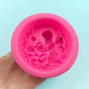Pink silicone angel child flower mold for DIY cake making or handmade soap crafts