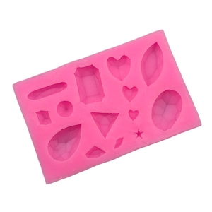 Stampo in silicone rosa con forme a cuore, gemma e geometriche per decorare torte