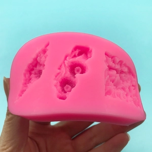 Pink silicone lace mold with three detailed leaf patterns for DIY fondant cake decoration