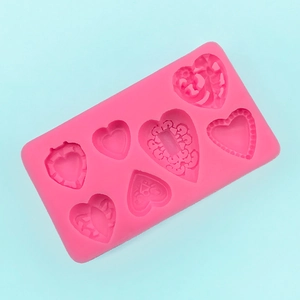 Pink heart-shaped silicone mold with 7 cavities for chocolate and DIY soap making
