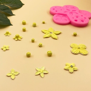 Pink silicone mold for DIY flower fondant cakes and resin art with realistic floral patterns