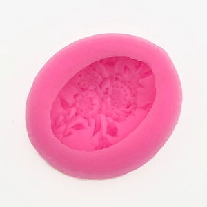 Detail view of pink sunflower silicone mold for fondant, chocolate and soap making crafts