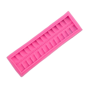 Pink silicone lace fondant mold with decorative wave pattern for DIY cake decorating