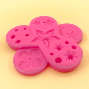 Pink silicone flower mold for fondant and DIY crafts with multi-cavity floral patterns