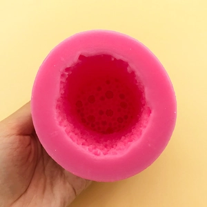 Pink cylindrical silicone mold with bubble texture for DIY aromatherapy candle making