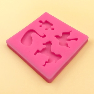 DIY 4-cavity pink silicone mold with puzzle, bird, and animal shapes for plaster crafts
