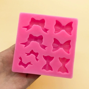 Pink silicone mold with 8 various bow shapes for DIY cake fondant and chocolate making