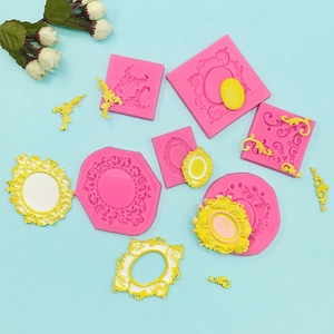 Baroque style silicone frame molds for fondant and clay on a light blue background