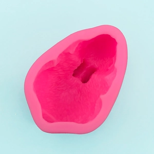 Detail view of the pink silicone mold interior showing fine 3D texture for baking and DIY crafts