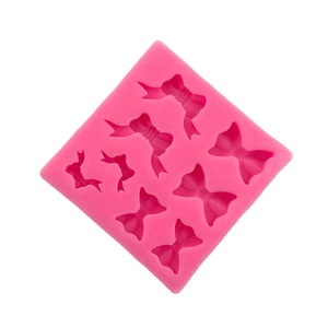 Pink silicone bow mold with 7 different styles for fondant and DIY baking decoration