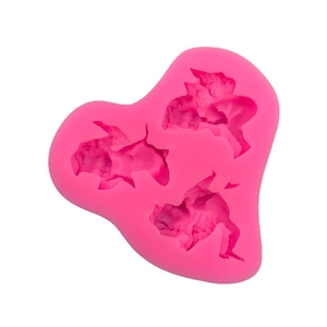Pink silicone mold featuring three detailed goldfish shapes for fondant or cake decoration