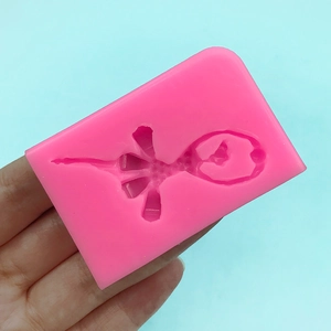 Pink rectangular silicone hummingbird mold for DIY fondant cake decorating and crafts