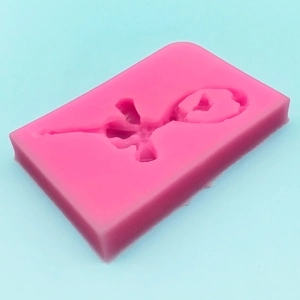 Detailed view of pink rose flower silicone mold for DIY fondant and baking cake decor