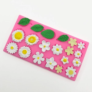 Pink silicone mold for DIY fondant daisy flowers and leaves craft for cake decoration