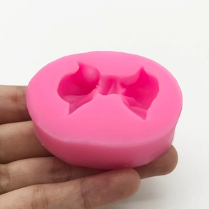 Pink silicone bow-knot mold for DIY chocolate fondant cake decoration and baking tool