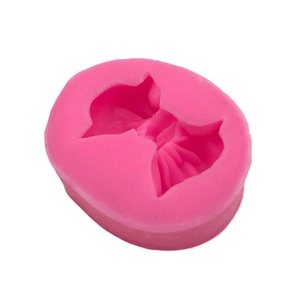 Pink silicone bow-shaped mold for DIY cake fondant and chocolate baking decoration