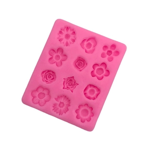 Pink silicone fondant mold with 12 diverse floral shapes for DIY cake and chocolate decoration