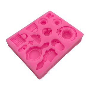 Pink silicone mold with vintage hat bag and umbrella shapes for fondant cake decoration