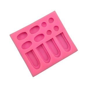 Pink silicone bunny ear mold with rectangular layout for baking or DIY resin craft
