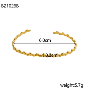 Detail view of golden stainless steel bubble texture bracelet with 6cm inner diameter