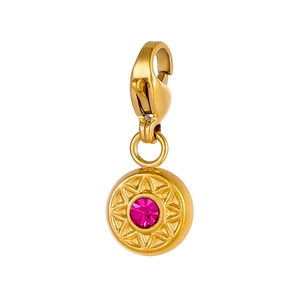 Macro detail of 18K gold plated celestial pendant with pink zircon and lobster clasp