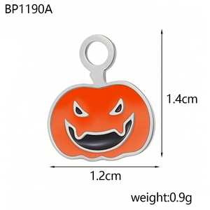 Macro shot showing dimensions of Jack-O-Lantern pumpkin pendant in stainless steel