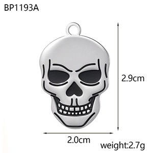 Polished stainless steel skull pendant with black enamel details for Halloween jewelry