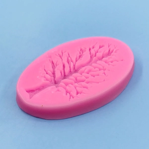 Pink Christmas tree branch silicone mold for baking, fondant, and resin crafts