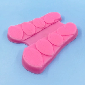Pink silicone leaf mold for fondant baking and soap making with realistic textures