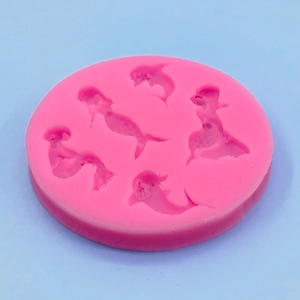 Pink ocean theme silicone mold with mermaid and dolphin shapes for cake decorating