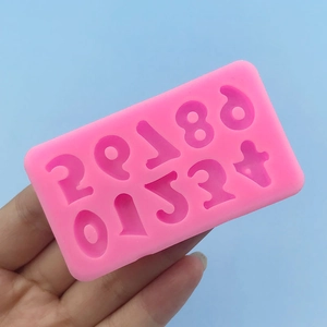 Pink silicone number mold for DIY cake decorating and crafts featuring 0-9 digits