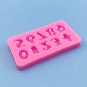 Pink silicone number mold for DIY cake decorating and chocolate baking on blue background
