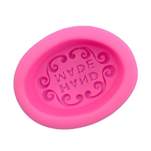 Pink oval silicone mold with HANDMADE lettering and vintage scrolls for soap making