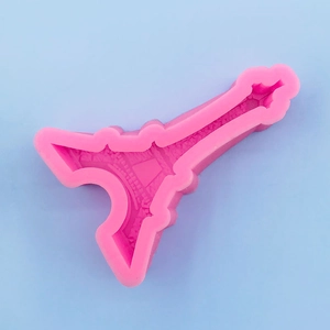 Detailed macro view of pink Eiffel Tower silicone mold for cake decorating and DIY crafts