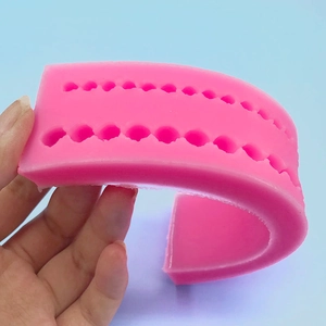 Flexible pink silicone pearl bead mold for DIY cake decorating and fondant edging strip
