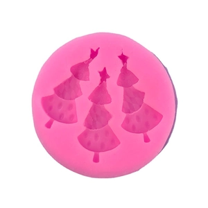 Pink silicone mold featuring three distinct Christmas tree shapes for DIY baking and crafts