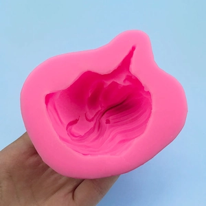 Pink silicone mold for mermaid tail cakes and handmade soaps in marine themed DIY projects