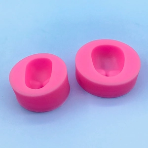 Pink silicone face mold set for handmade soap and fondant baking, two piece oval design