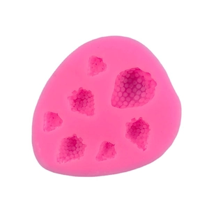 Pink silicone mold featuring multiple strawberry shapes for DIY baking and fondant decor