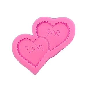 Pink heart-shaped silicone mold with MR&MRS lettering for cake decor and chocolate making