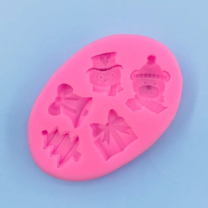 Pink silicone mold featuring Christmas bell, snowman, bear, tree and gift box shapes