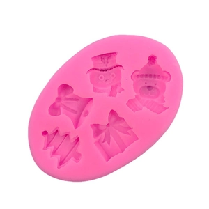 Pink silicone mold with Christmas tree snowman and gift shapes for baking and fondant