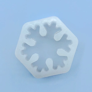 Vue détaillée de dessus d'un moule en silicone flocon de neige pour pâtisserie et DIY